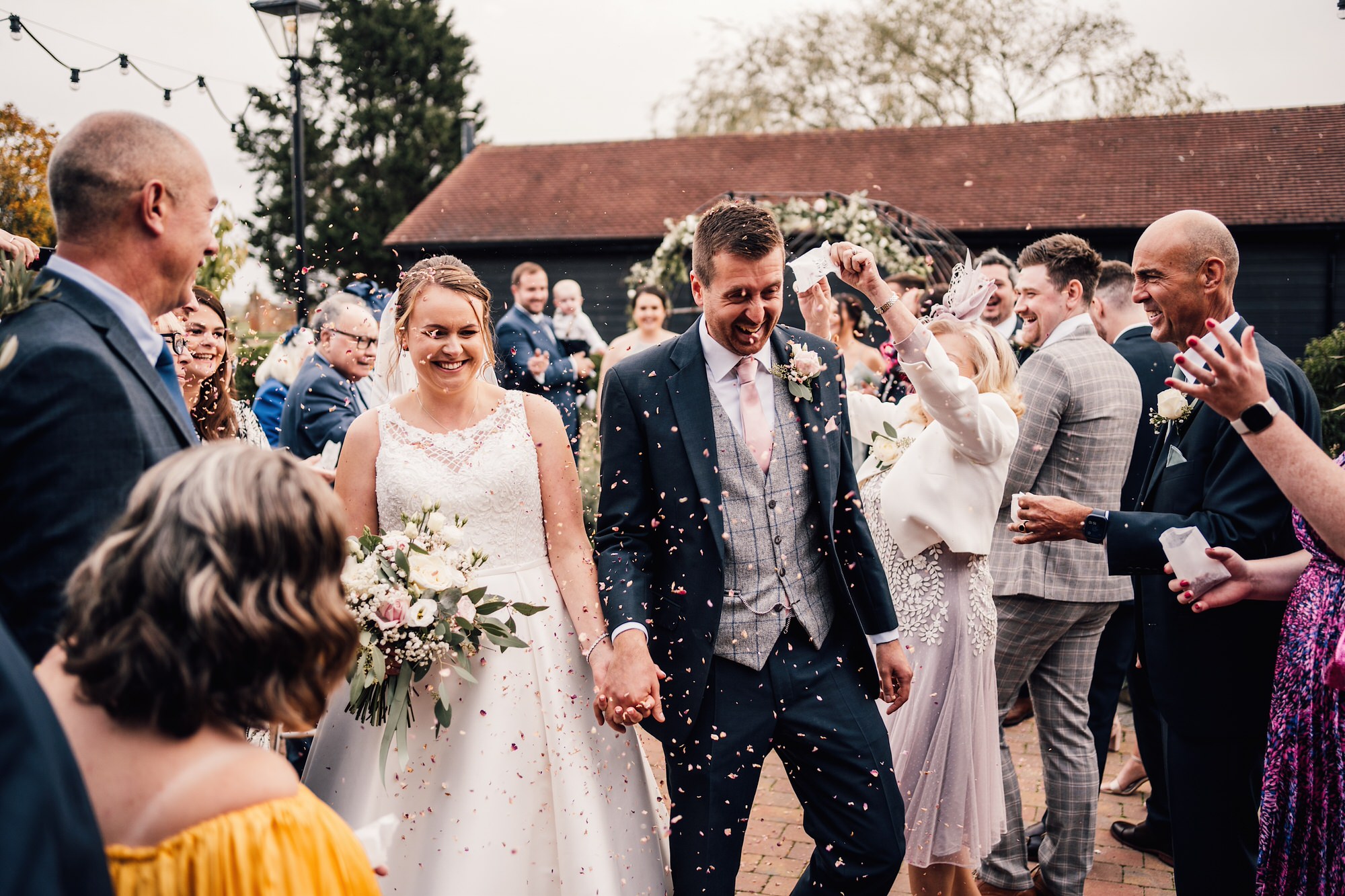confetti photo of bride and groom at winters tale country barn