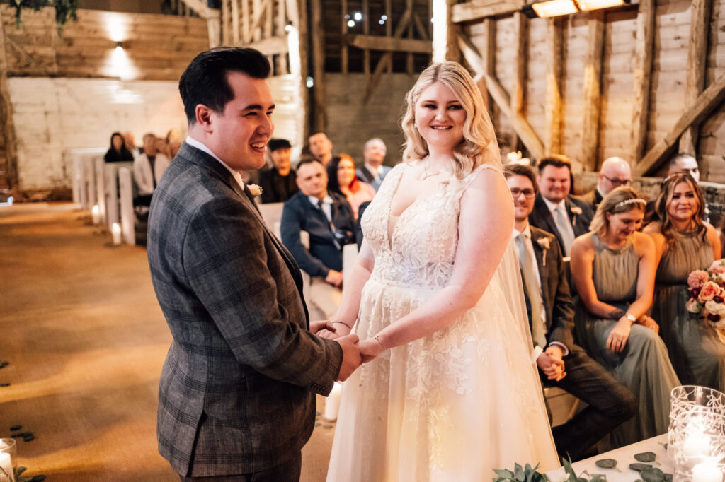 milling barn wedding ceremony photo with bride and groom 