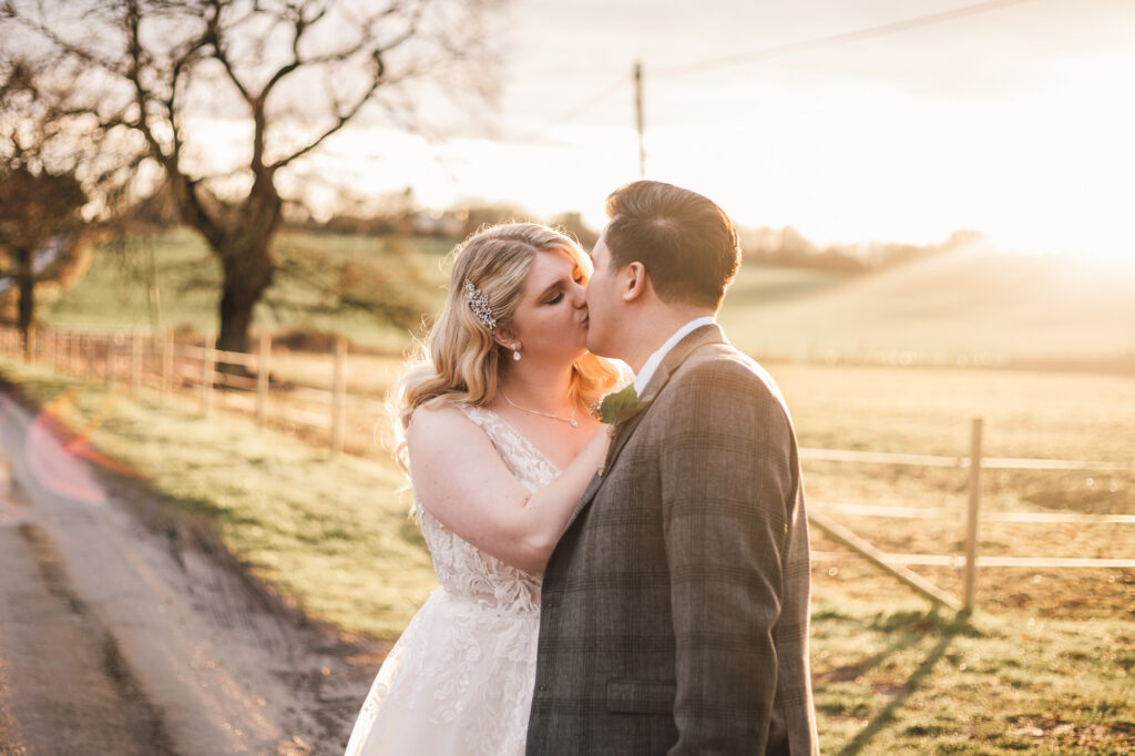 sunset couples photos at milling barn wedding venue 