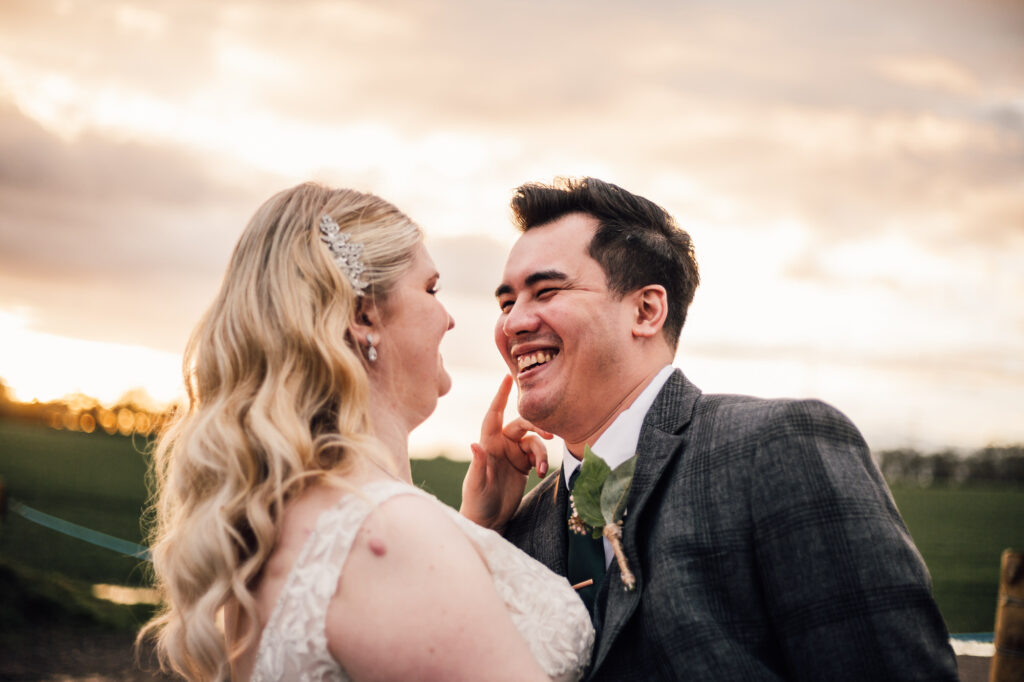 sunset couples photos at milling barn wedding venue 
