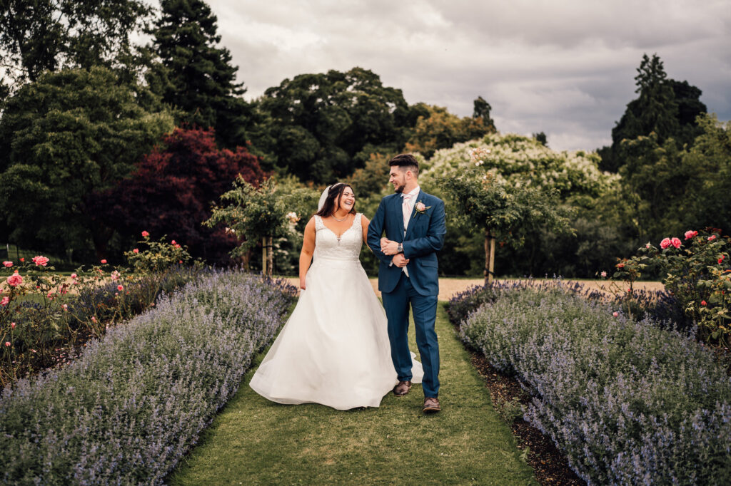 bride and groom couples portrait with lavender and flowers 